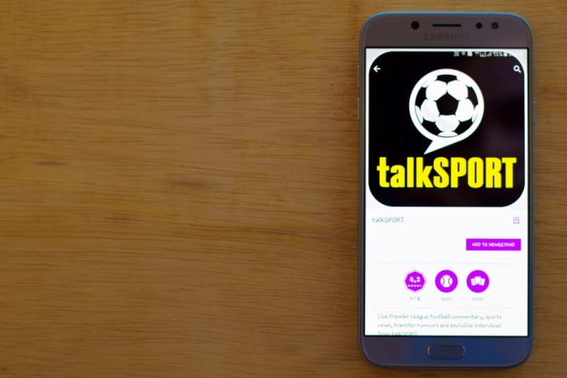 Talksport logo on a smartphone