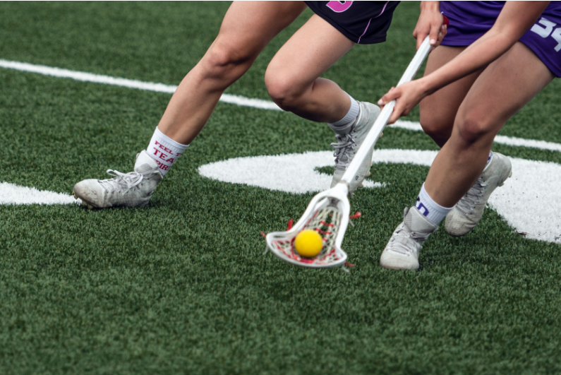 College women playing lacrosse