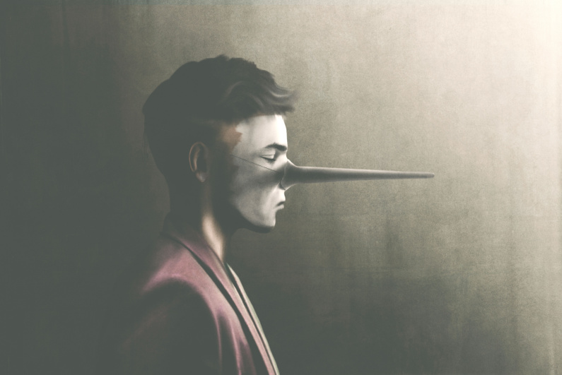 Man wearing Pinocchio nose