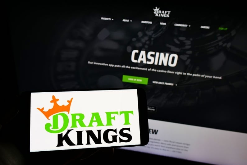 DraftKings on phone with DraftKings casino in background